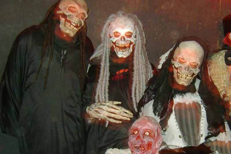 Horror Hall Haunted House in New Mexico skeleton ghost family