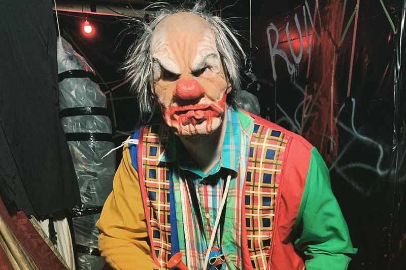Tupelo Haunted Castle haunted house in Mississippi old creepy joker staring